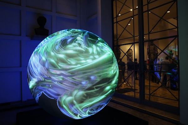 LED sphere at the FAAP entrance at night