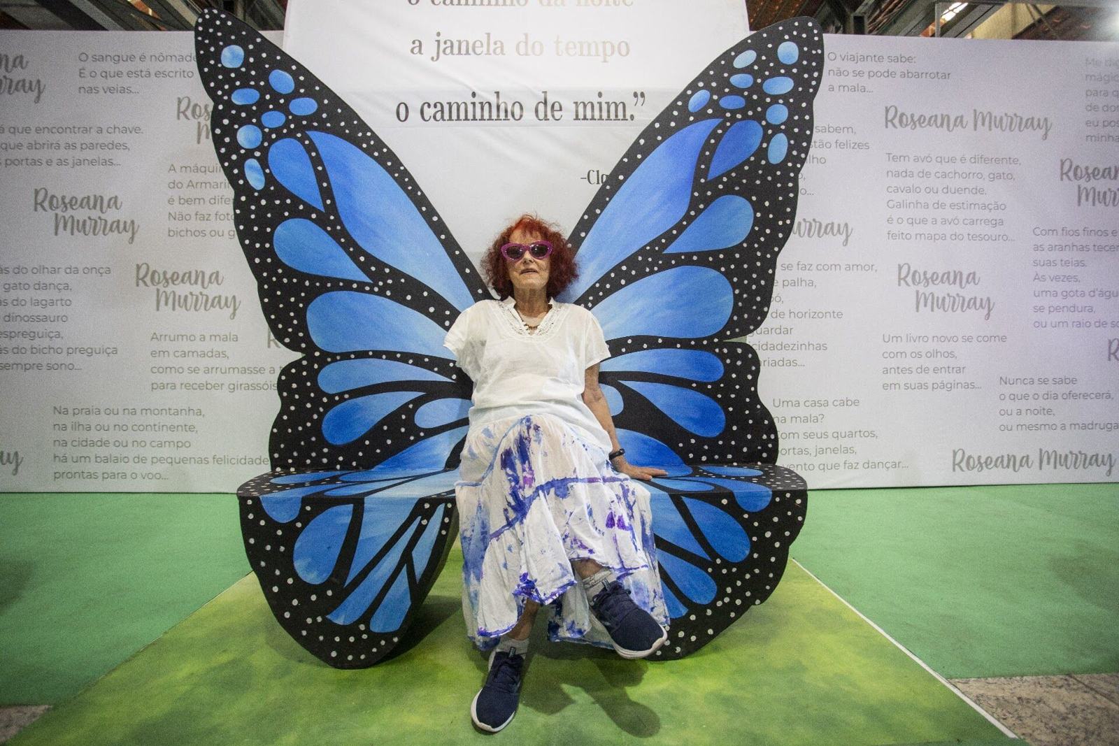 Visitor posing with butterfly wings