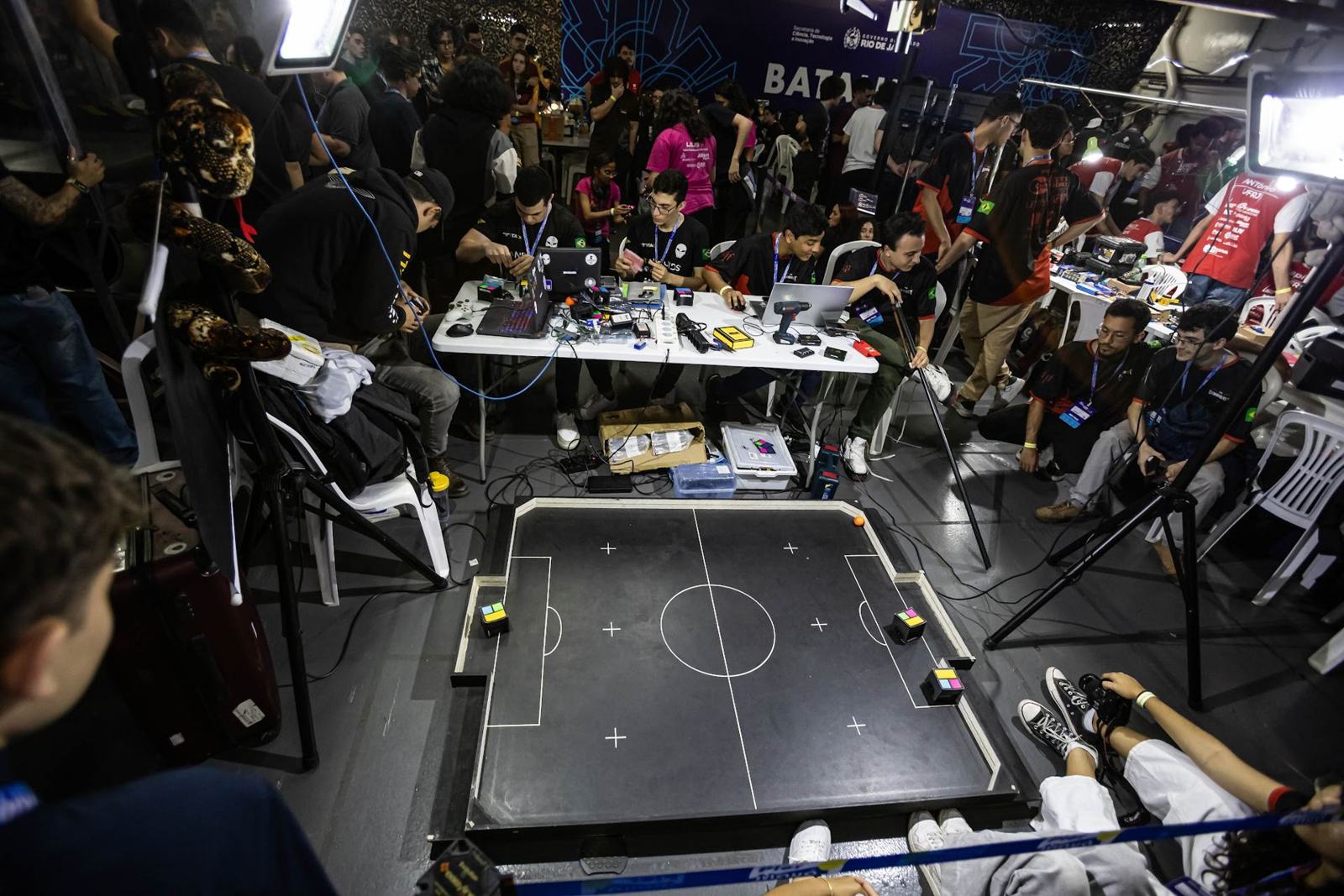 Robot competition with an audience inside the ship