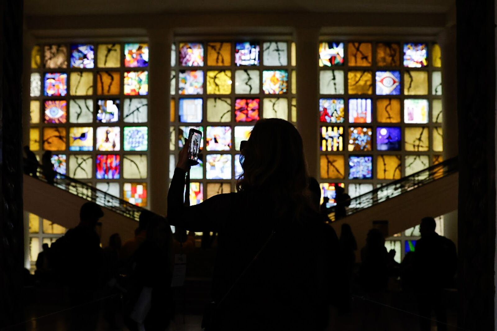 FAAP auditorium with illuminated stained glass