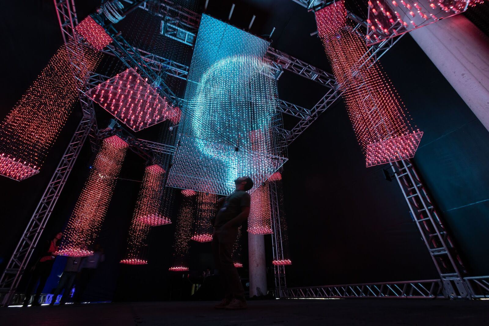 LED Pulse installation with a suspended glowing head