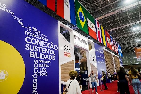 Convention backdrop with a row of flags