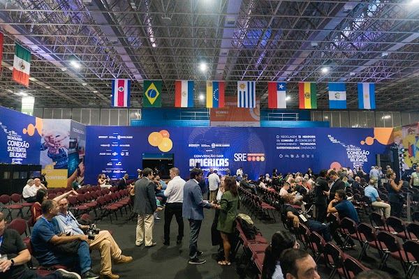 Convention main stage with audience and flags